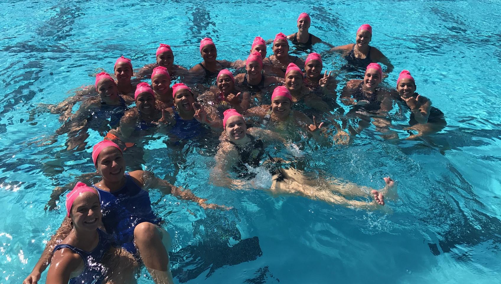Citrus Women's Polo in their pink caps. Photo credit: Jennifer Spalding