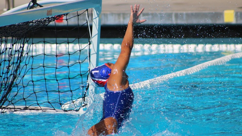 Goalie Dynalee Huerta stretches all the way out for a save, in action last week.