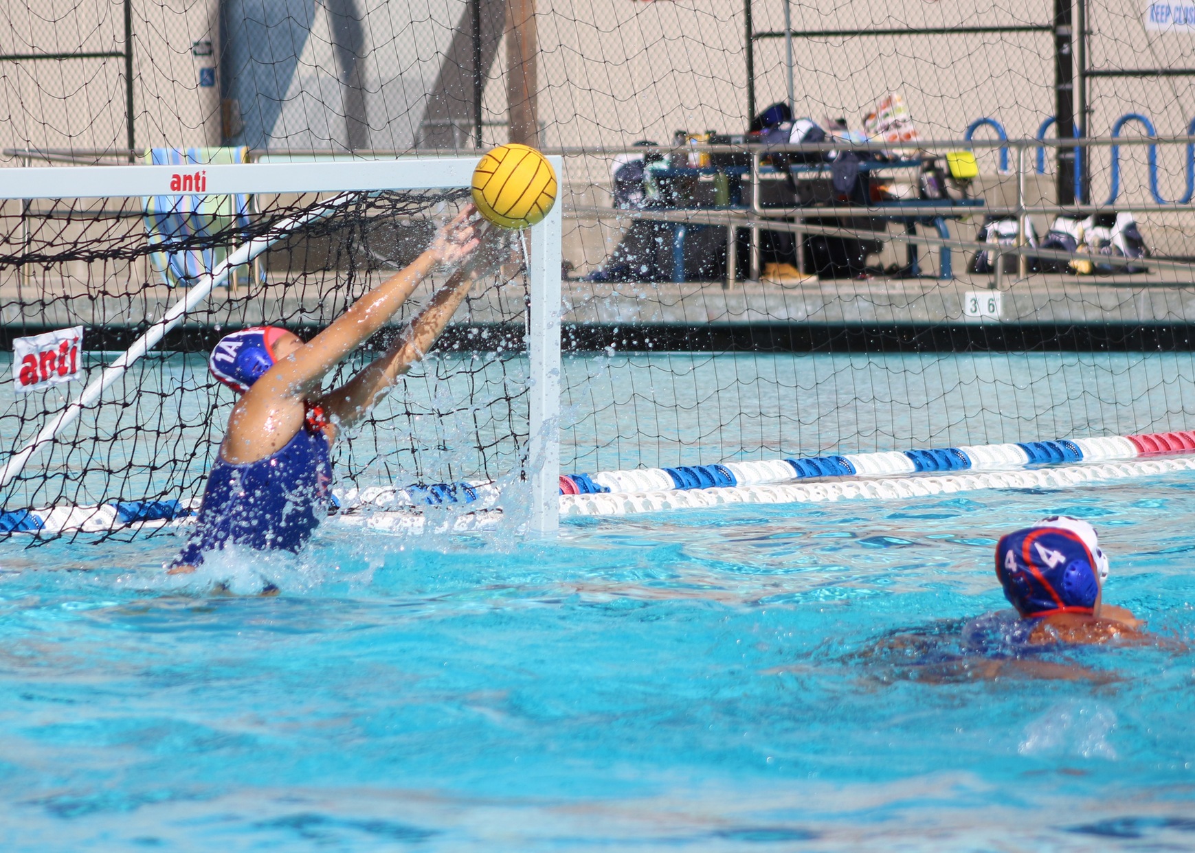 Goalie Ceraiah Riley stretches out for 1 of her 10 saves vs San Diego Mesa Thursday. Image: Samantha Reyes