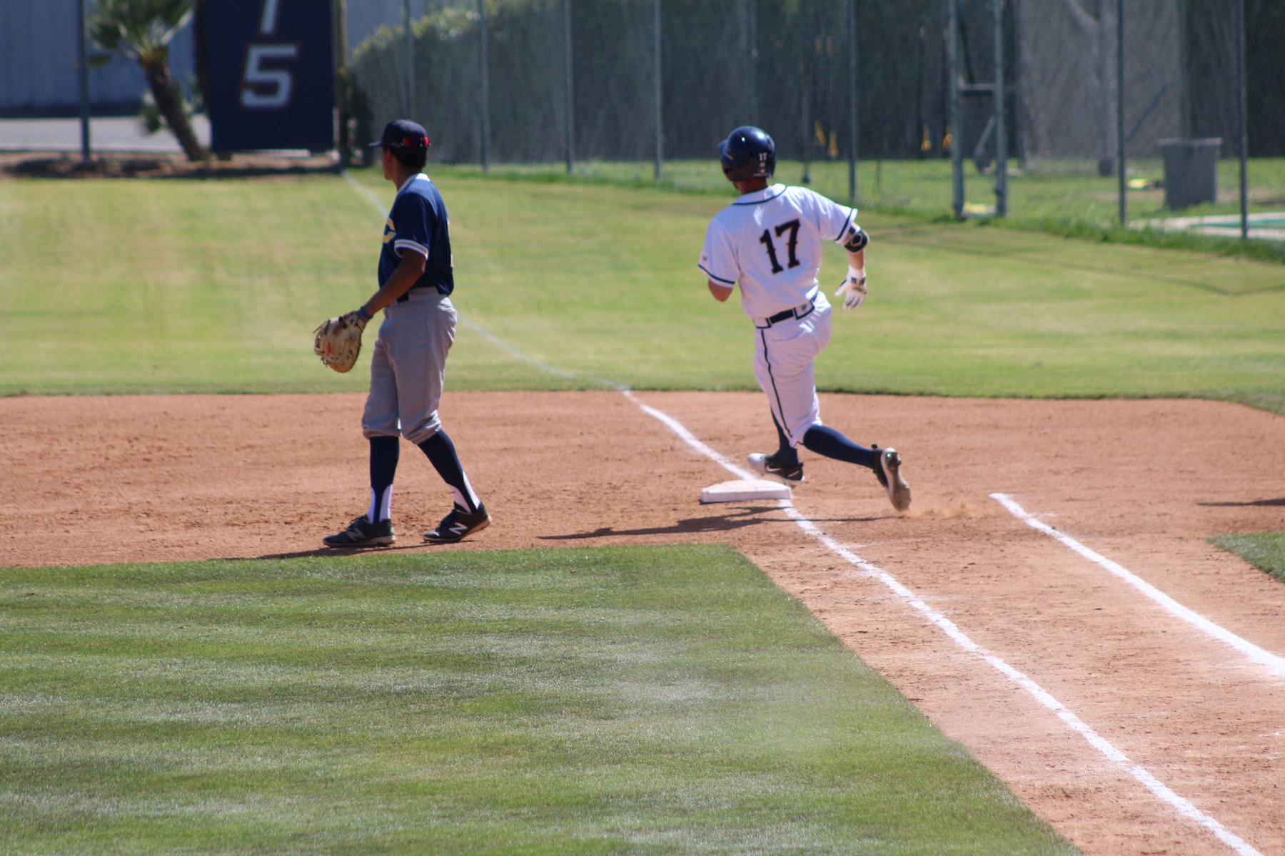 Thomas Chavez rounds first base on his way to a double.