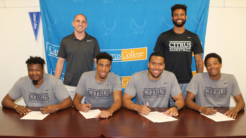 Four members from the 2016-2017 Citrus College Men's Basketball program have signed scholarship offers. Back Row (L-to-R): Head Coach Brett Lauer & Assistant Coach Michael Robinson. Front Row (L-to-R): Tyler LaCour, Kenneth Cyprian, Calvin Martin, and Khalil Williams. 