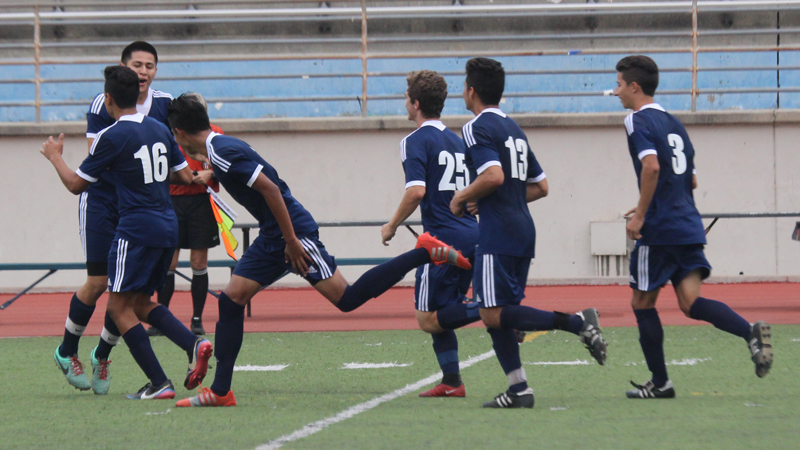 The Owls celebrate freshman Carlos Cazares' game winner on Friday afternoon against Glendale.