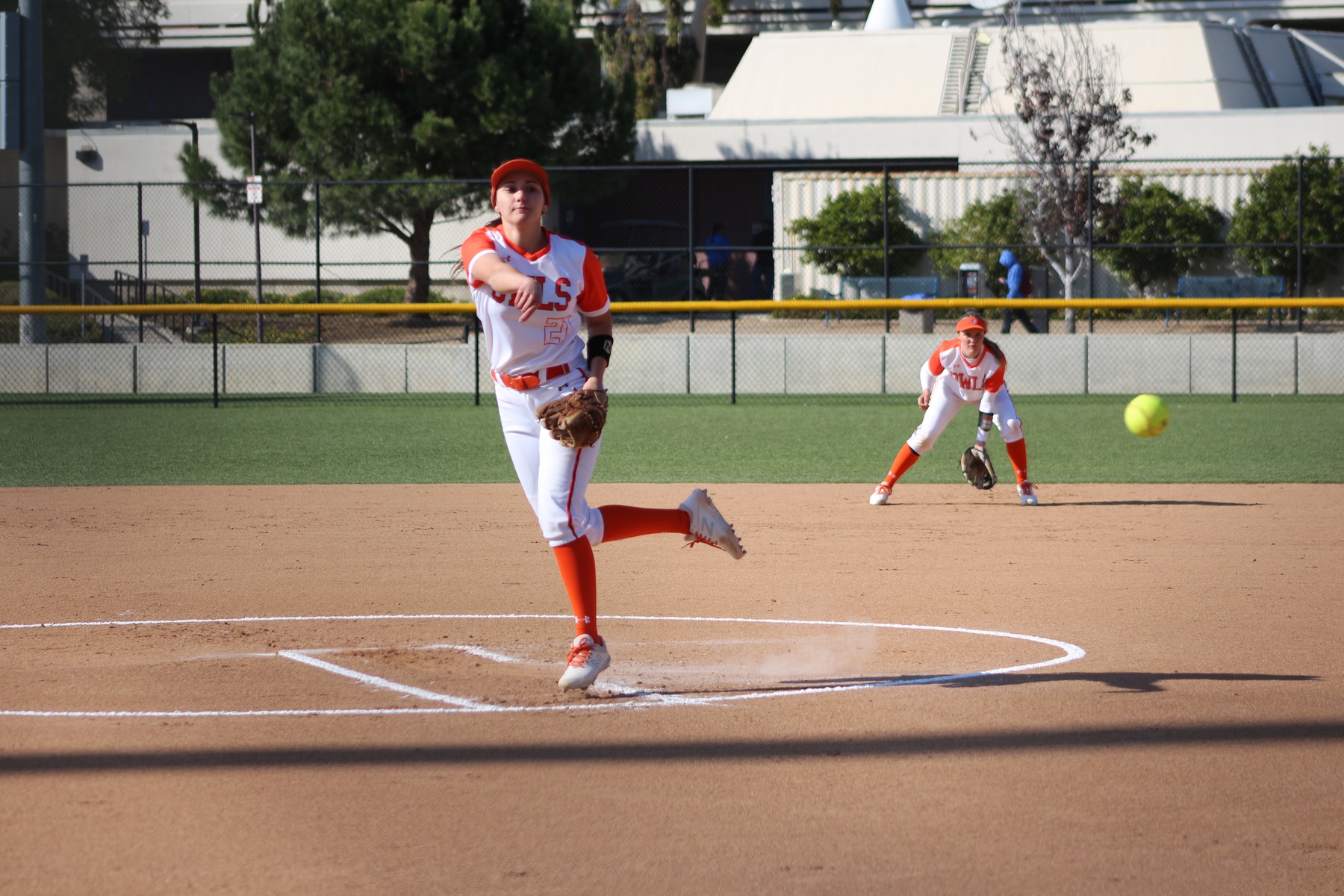 Emily Peredez delivers form the mound as Becky Winder prepares at 2nd. Photo credit: Treyvon Watts-Hale