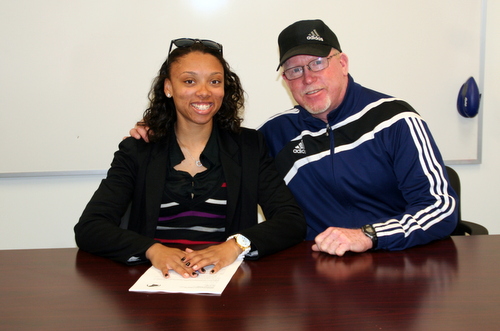 Sophomore Jasmine Williams, pictured with Head Women's Soccer Coach Tim Tracey, signed a letter of intent to play at Cal State San Bernardino next fall on Wednesday.
