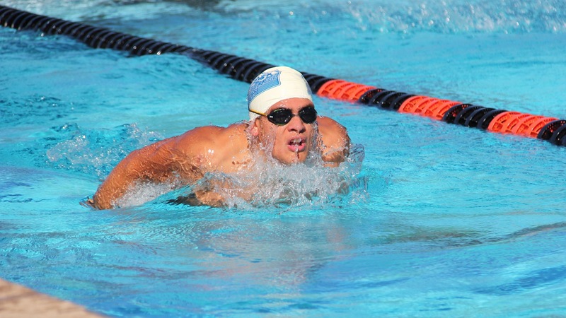 Rolan Solis won his heat in the 100-yard fly, clocking in at 1:04.62. Photo by Sammi Wellman