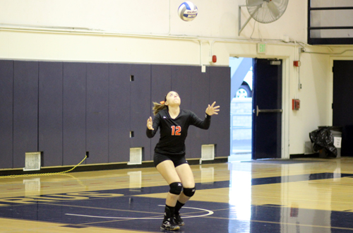 Freshman Jackie Medina had a team high seven digs in their lost to Orange Coast. Photo By: Robert Lopez