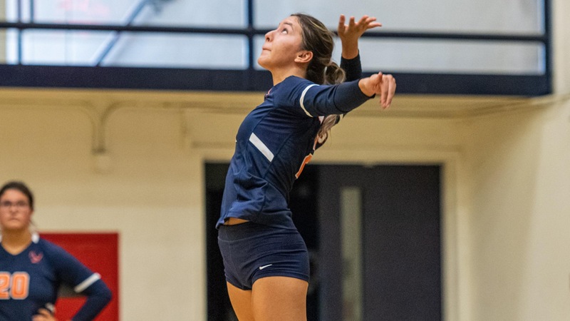 Caren Stone had five aces for the Owls against the Cougars. Photo by Jacob Bramley
