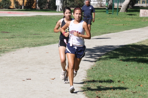 Freshman Julia Galvez was the first Owl across the finish line at the SoCal Championships. Photo By: Sam Ungeheier