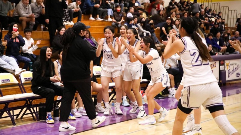 Jessica Samson celebrating with her Diamond Bar High School girls' varsity team.
